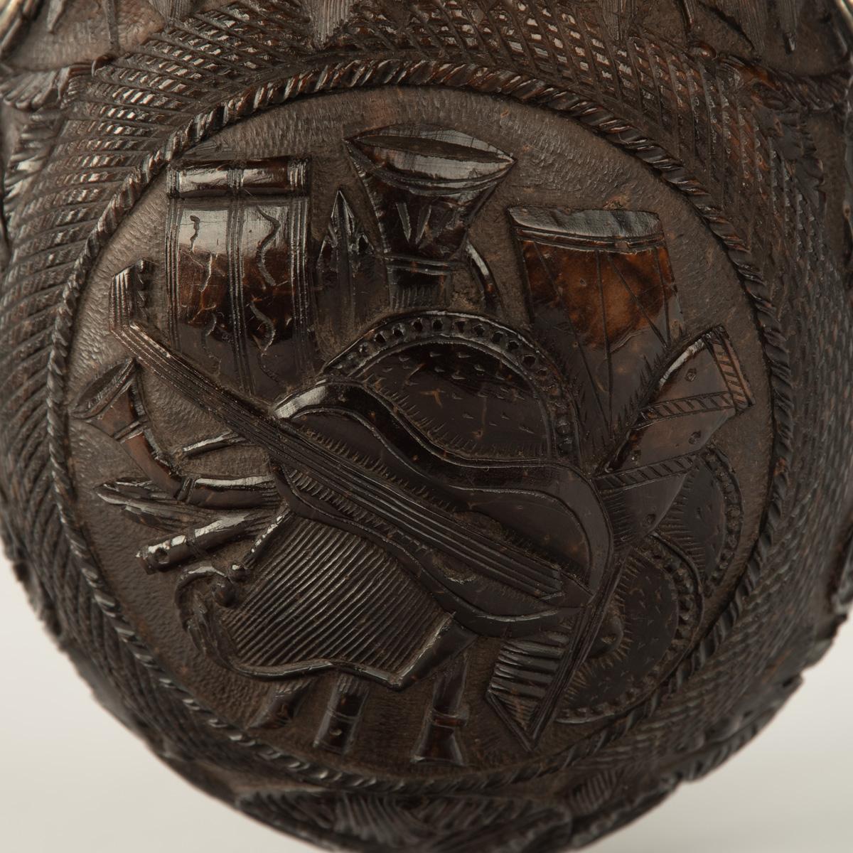 19th Century A sailor’s carved coconut Bugbear powder flask For Sale