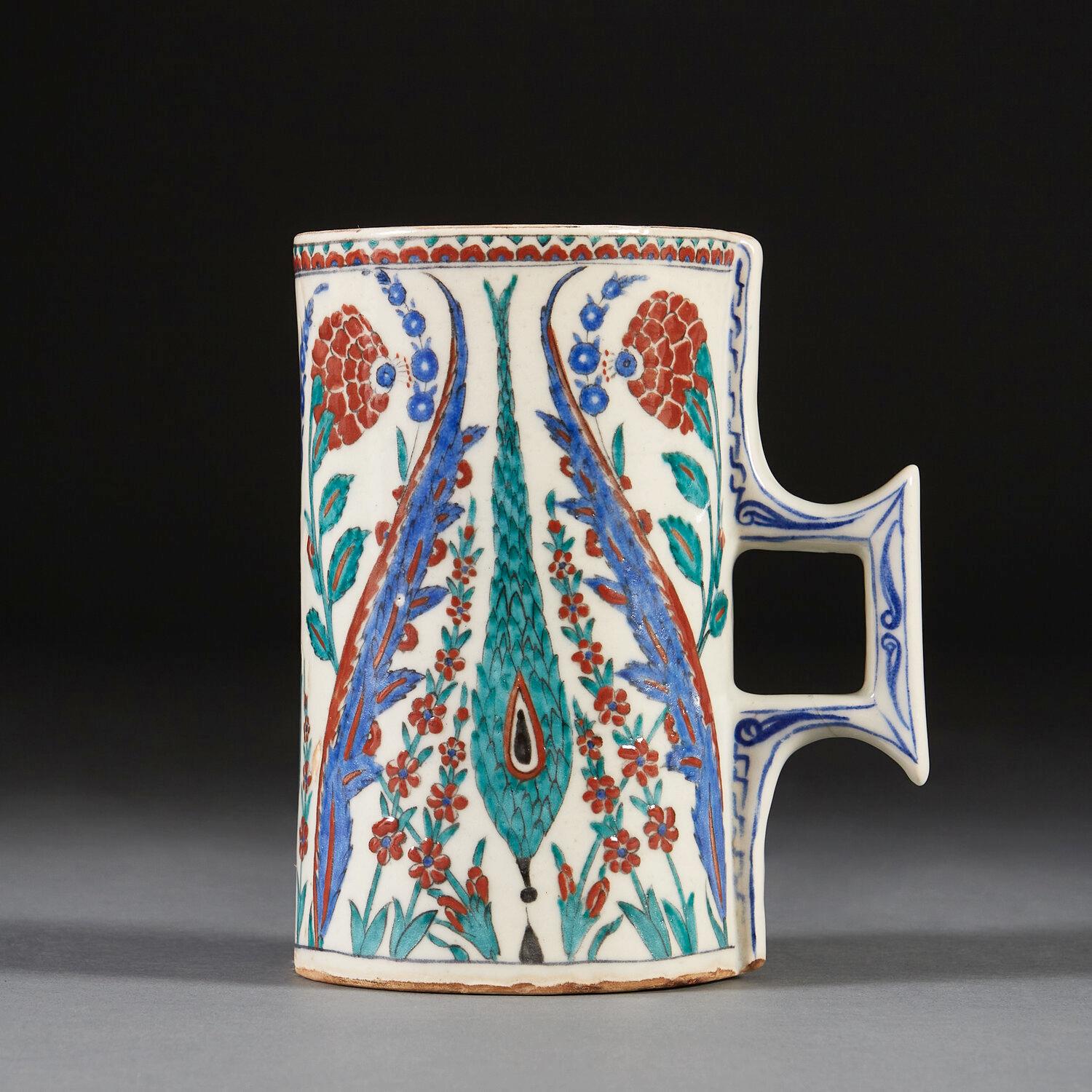 A mid-nineteenth century Samson pottery jug of large scale, decorated in the Iznik style with a white ground overlaid with tulips and chrysanthemums.
