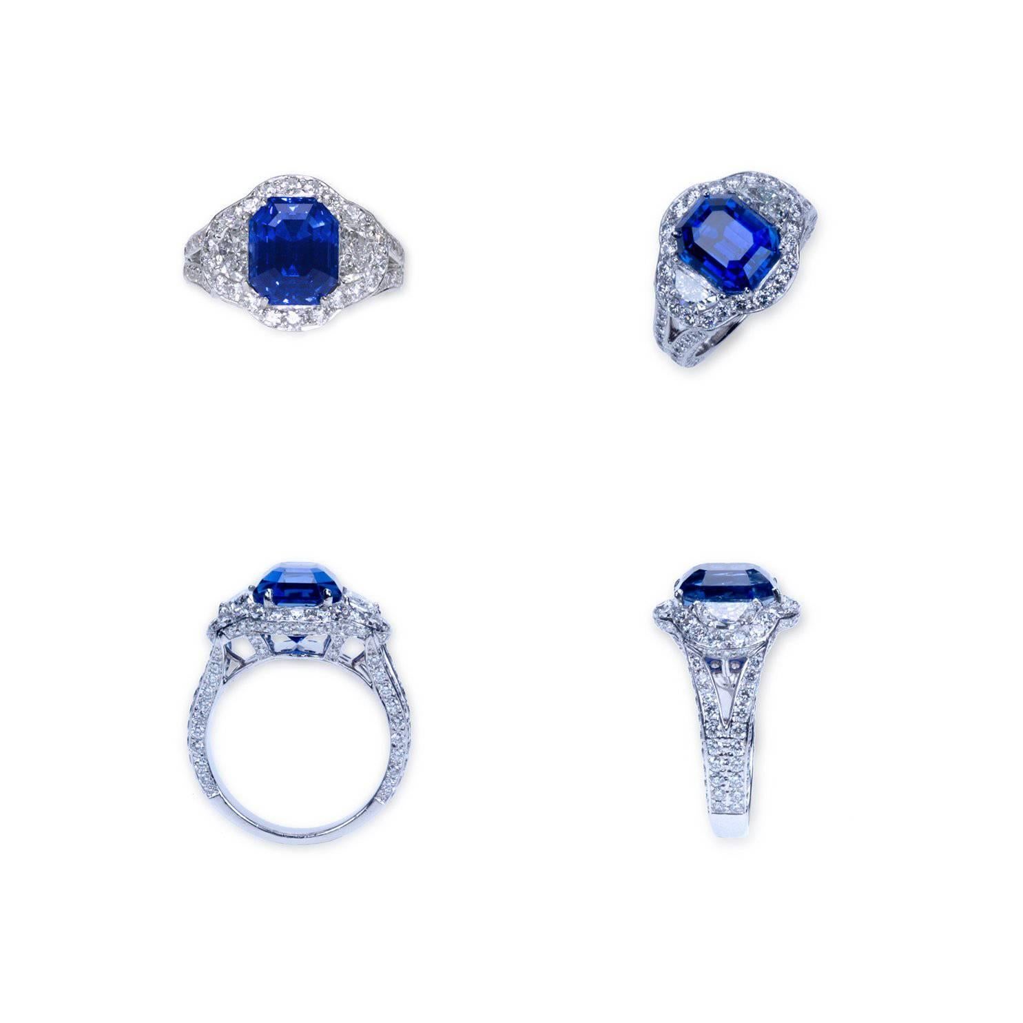 A "Samuel Getz" Platinum Sapphire and Diamond Ring Featuring an Exceptional Natural Unheated Emerald Cut Blue Sapphire, 5.97 Carats ([10.19 x 8.40 x 7.35 mm.]. [Sri Lanka] [AGL Report and TGL Report], a Pair Half Moon Shape Diamonds, 0.86