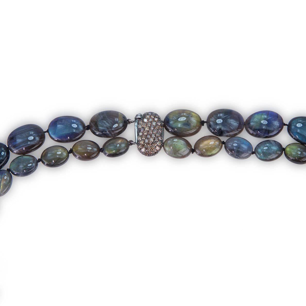 A "Samuel Getz" Spectrolite (Labradorite) Bead Necklace Featuring [27] 16 x 12 mm. and [41] 12 x 9 mm. Oval Shaped Beads Strung and Mounted on a Double Sided 18 Karat White Gold Clasp Pavé Set with 105 Cognac Colored Diamonds Weighting a