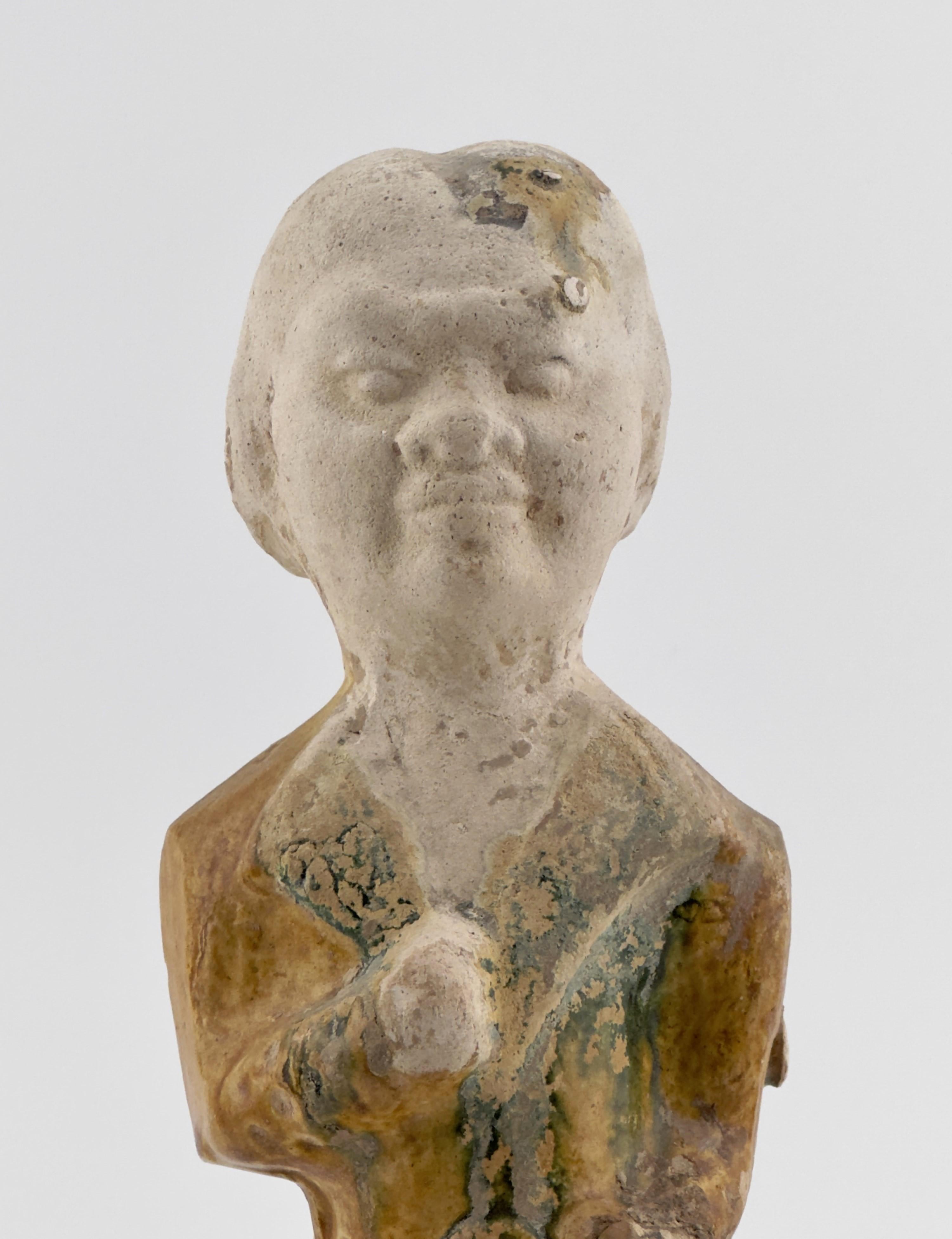 Hong Kong A Sancai-Glazed Pottery Figure of Guardian Mingqi, Tang Dynasty(7-8th century)