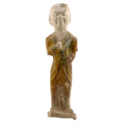 A Sancai-Glazed Pottery Figure of Guardian Mingqi, Tang Dynasty(7-8th century)