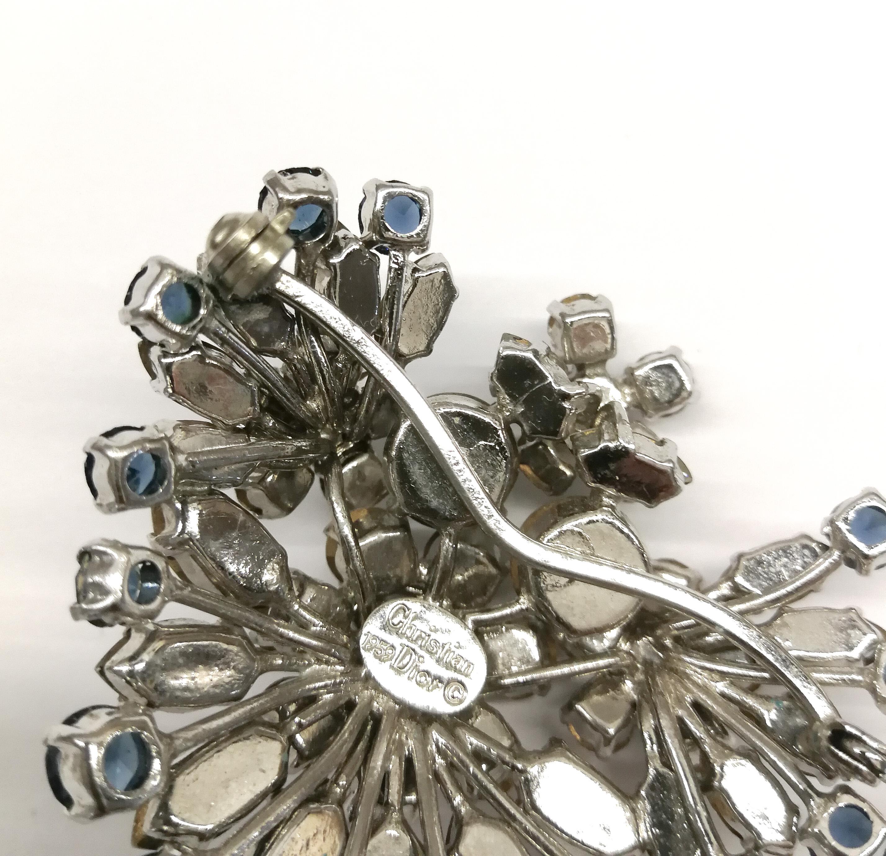 A sapphire and clear paste 'cluster' brooch, Christian Dior, Germany, 1959. 1