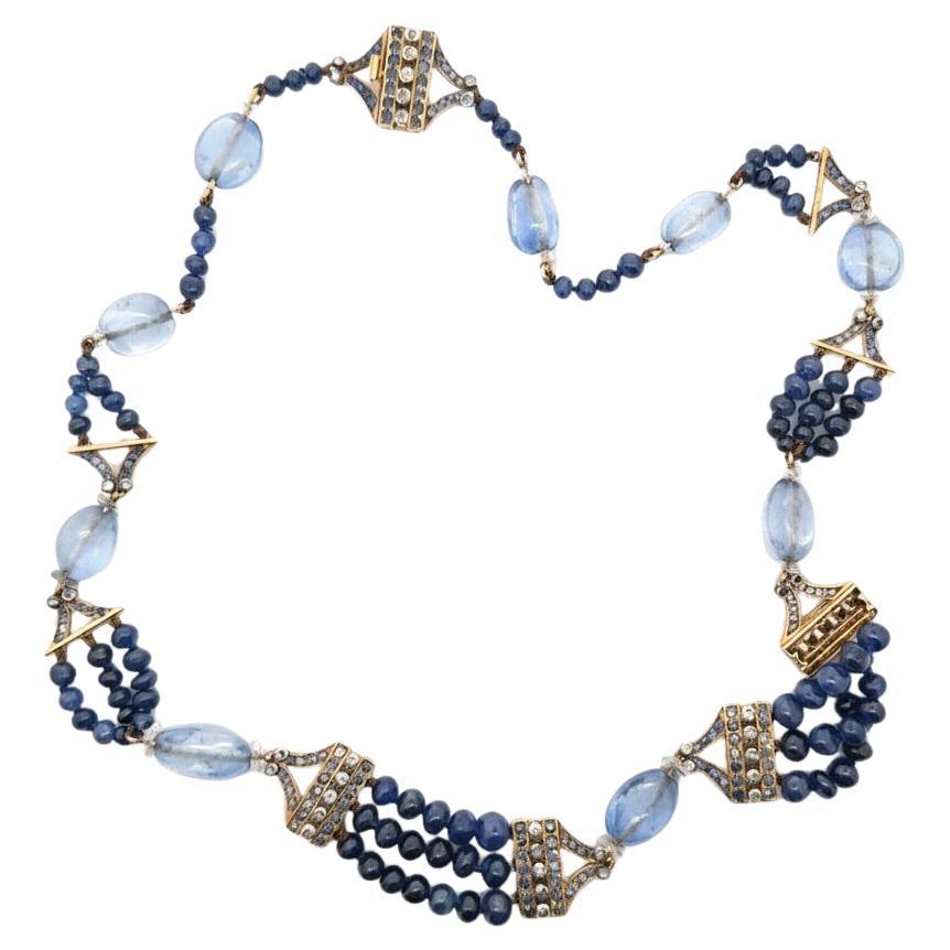 A sapphire and diamond bead necklace. en vente