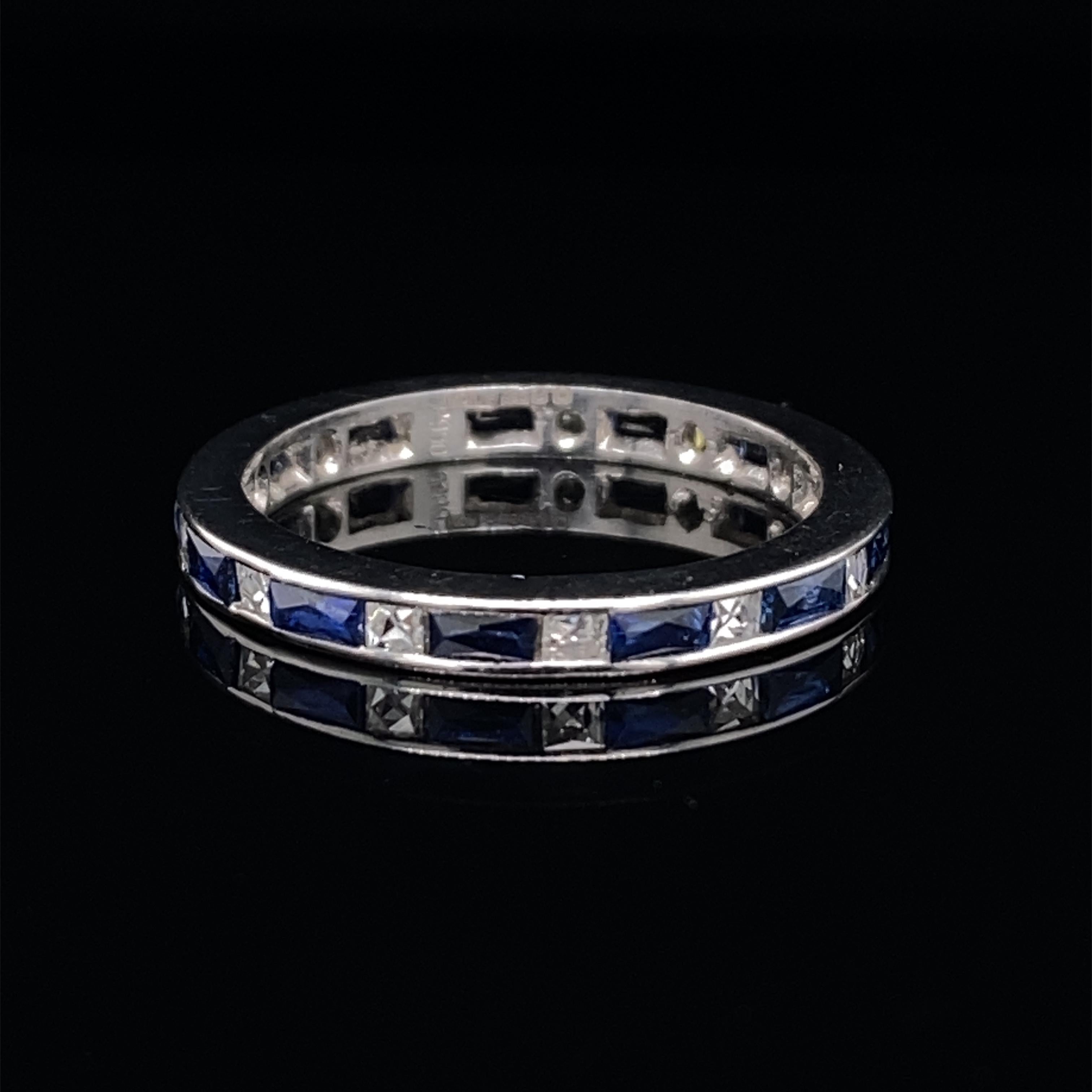 A sapphire and diamond full eternity ring in platinum.

A beautiful full eternity band, set with a single row of alternating French cut diamonds and baguette cut sapphires, the diamonds are of high colour and clarity, assessed by ourselves as G