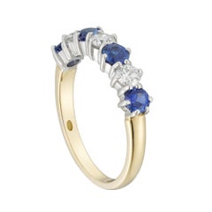 Un anillo con siete piedras: zafiros y diamantes