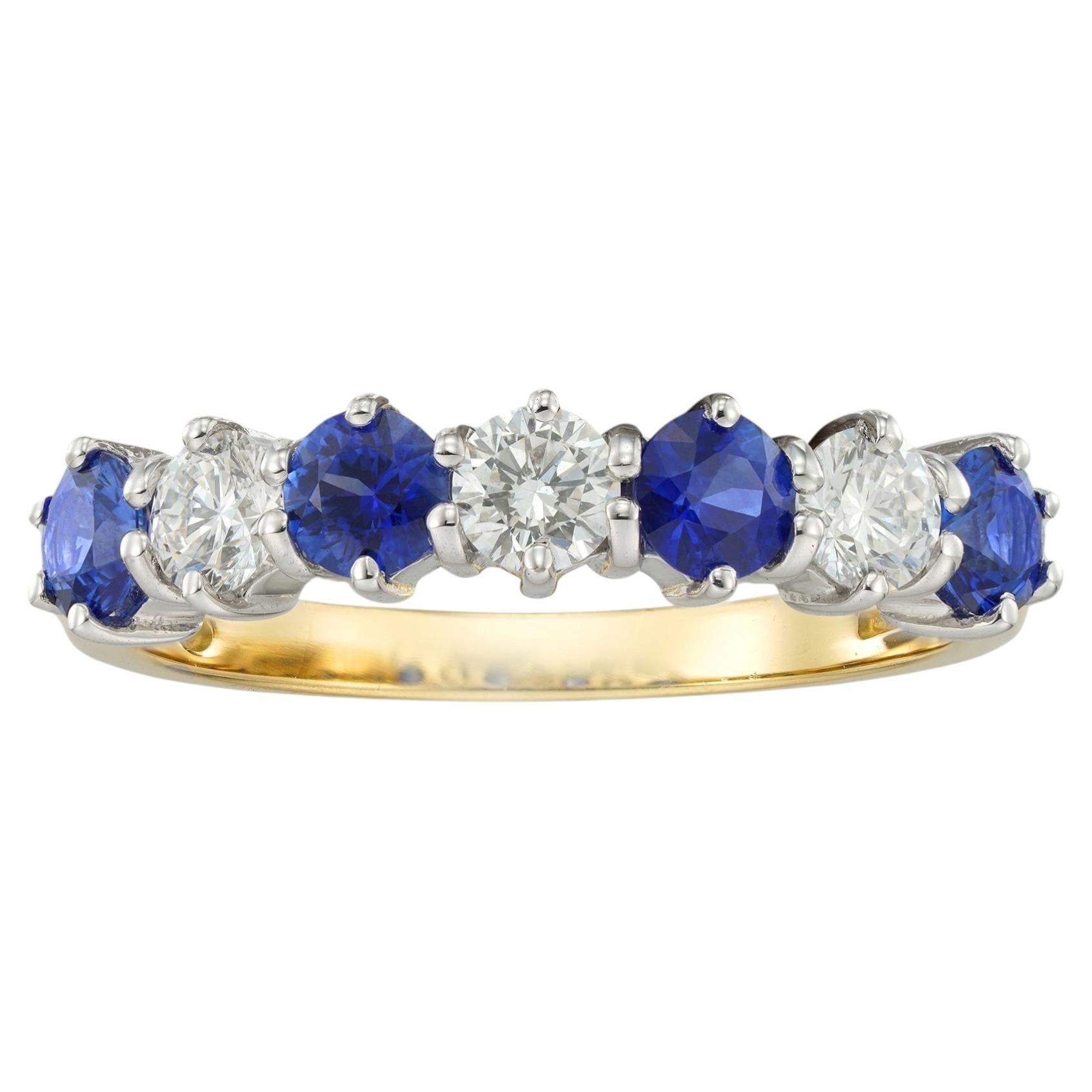Un anello con sette pietre: zaffiri e diamanti