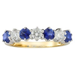 Un anillo con siete piedras: zafiros y diamantes