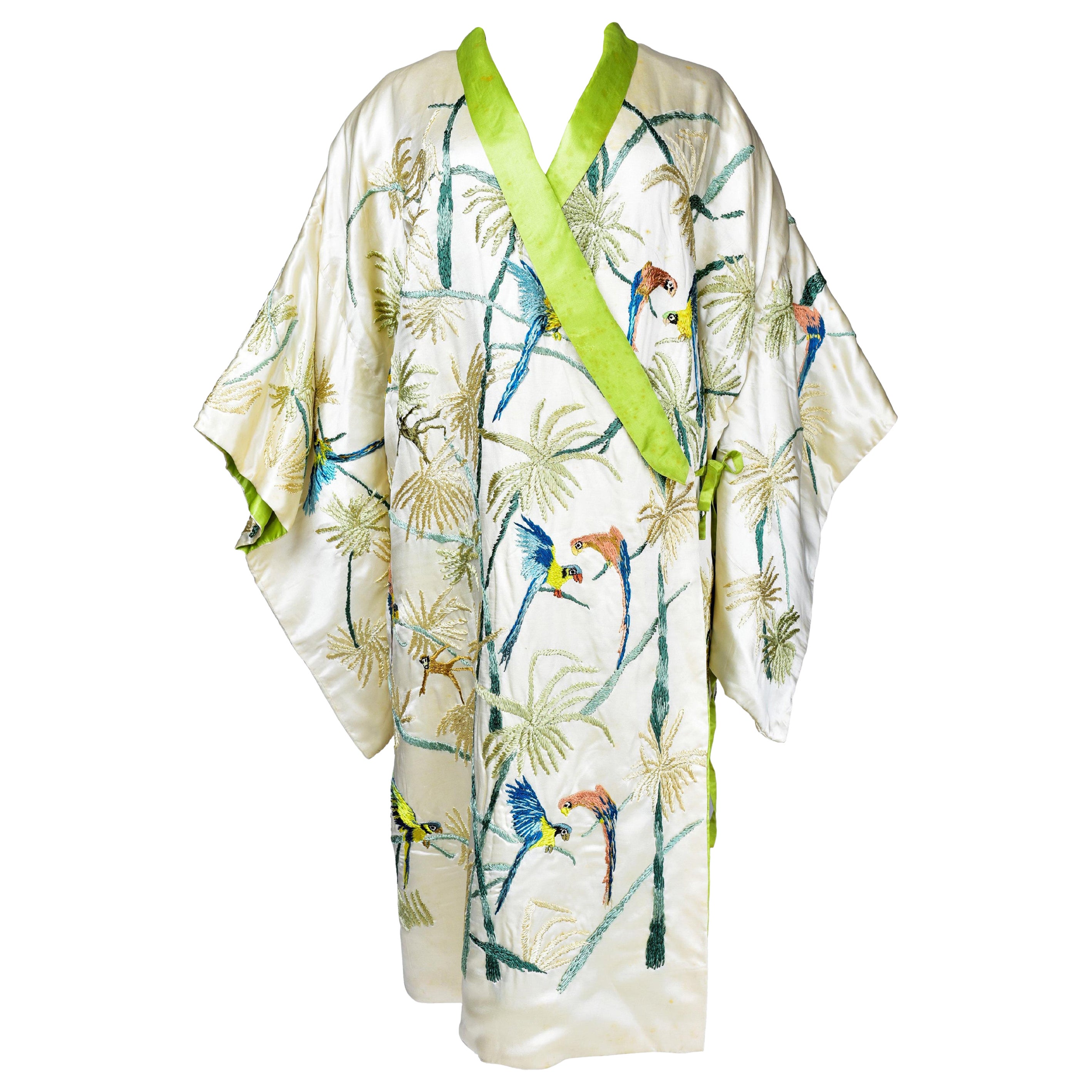 A Satin Embroidered Evening Kimono with palm trees and parrots France Circa 1930