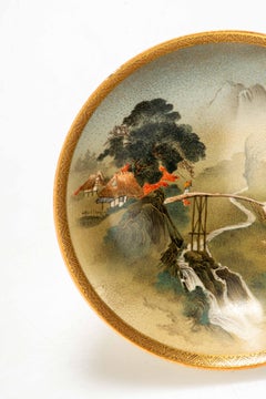 A Satsuma bowl decorated with a striking landscape