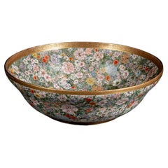 A Satsuma ceramic bowl decorated with a millefiori motif, signed Kinkozan