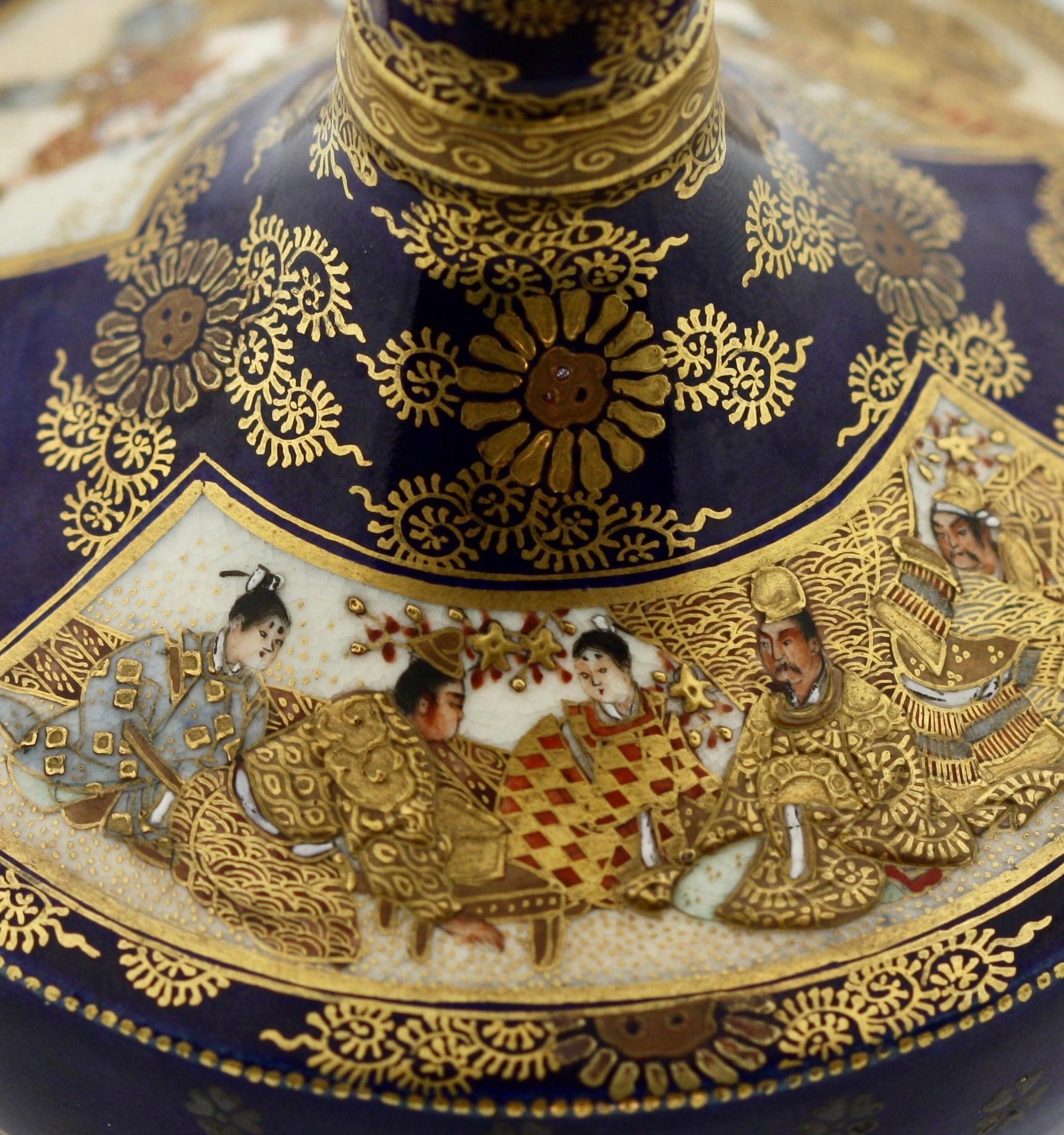 A Satsuma earthenware vase,
by Kinkozan,
Japanese, Meiji period (1868-1912)
decorated in polychrome enamels and gilt over a clear, crackled glaze, delicately painted with a lady and children, the reverse with a flowering garden between