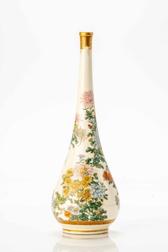 A Satsuma vase decorated with a garden of chrysanthemums
