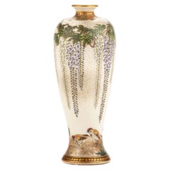A Satsuma vase decorated with leaf motif and glitter, signed Kinkozan