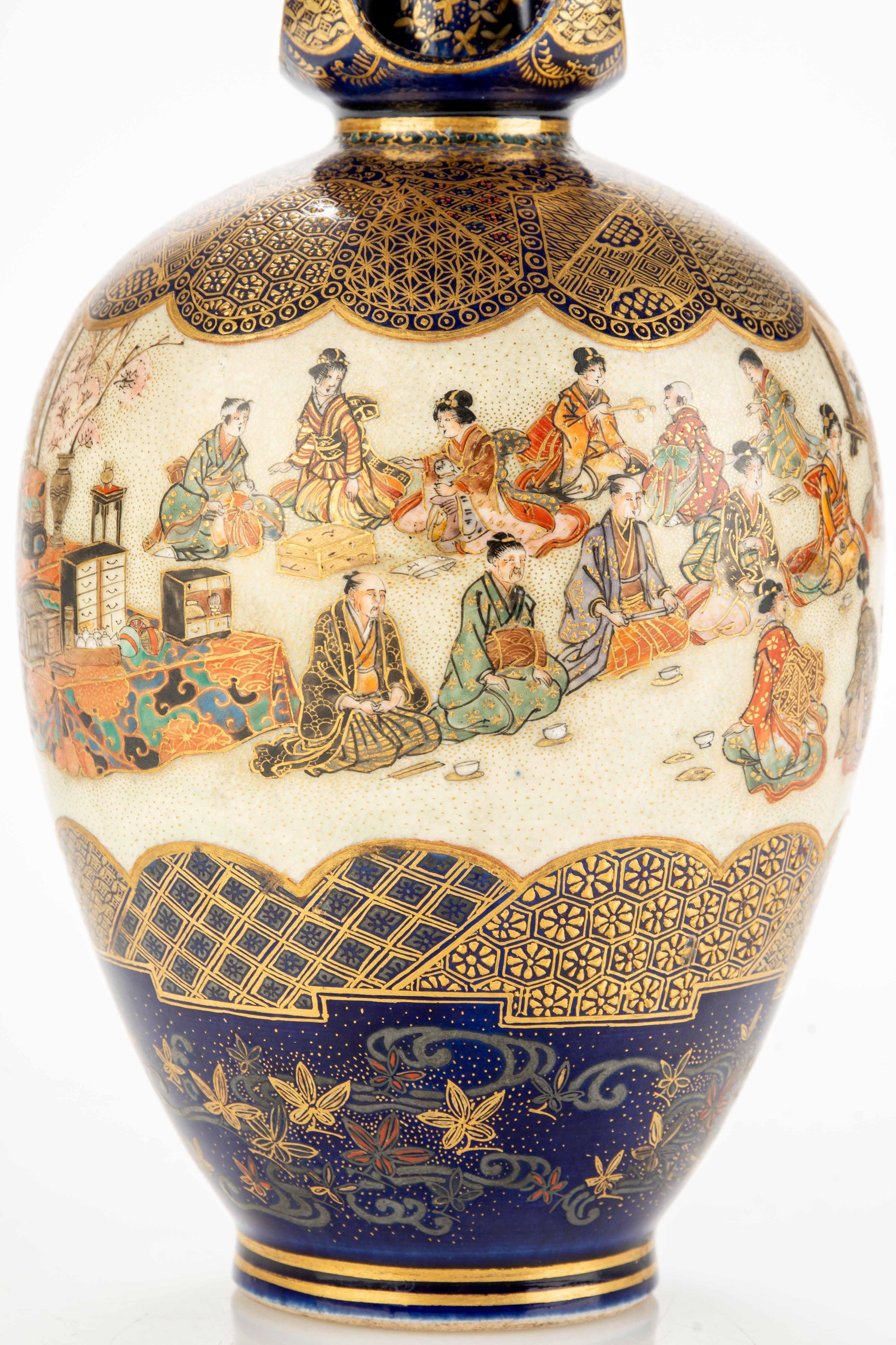 19th Century A Satsuma vase with numerous figures bringing gift