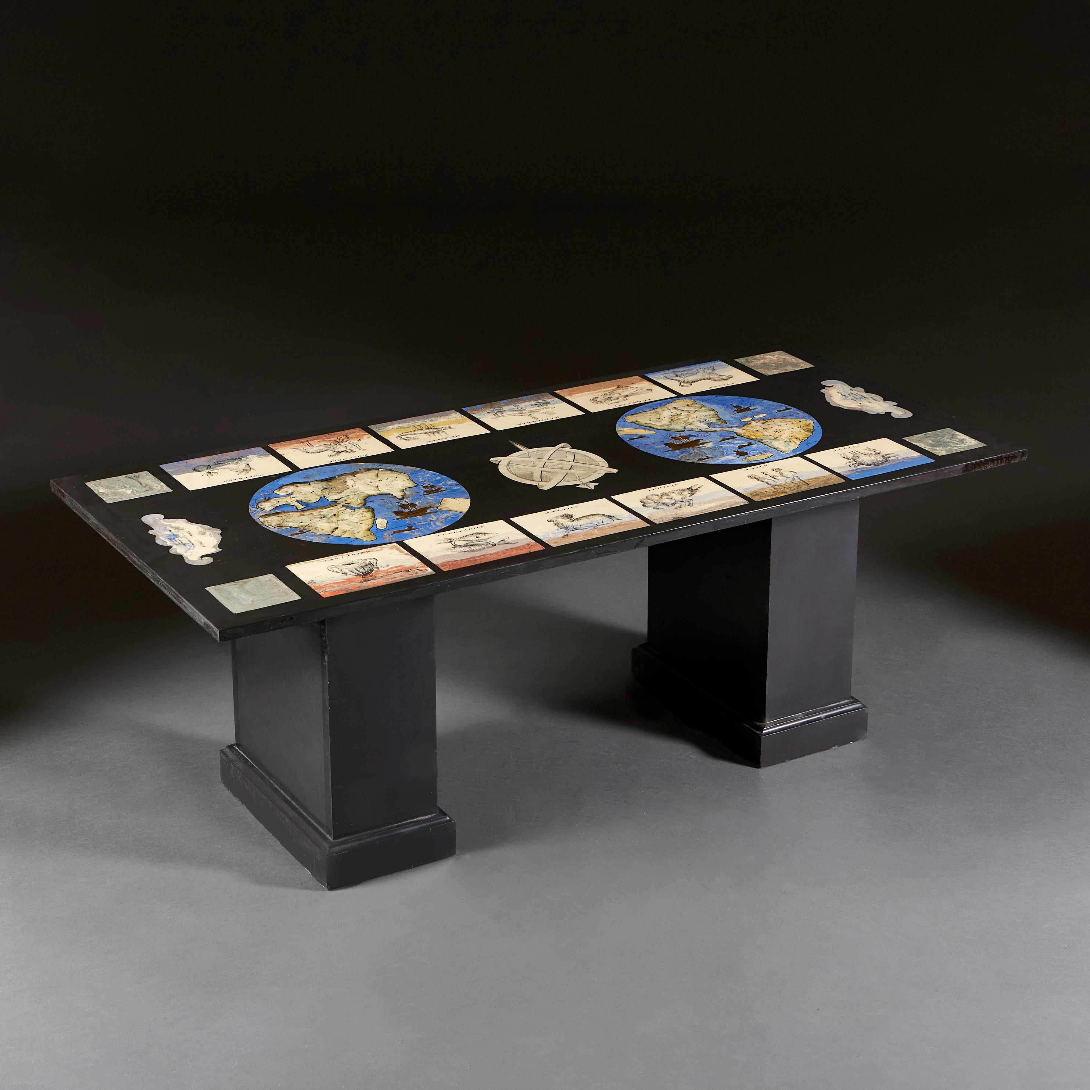 An unusual scagliola coffee table, the top with the signs of the Zodiac, and world maps on a charcoal ground, resting on two plinth bases.