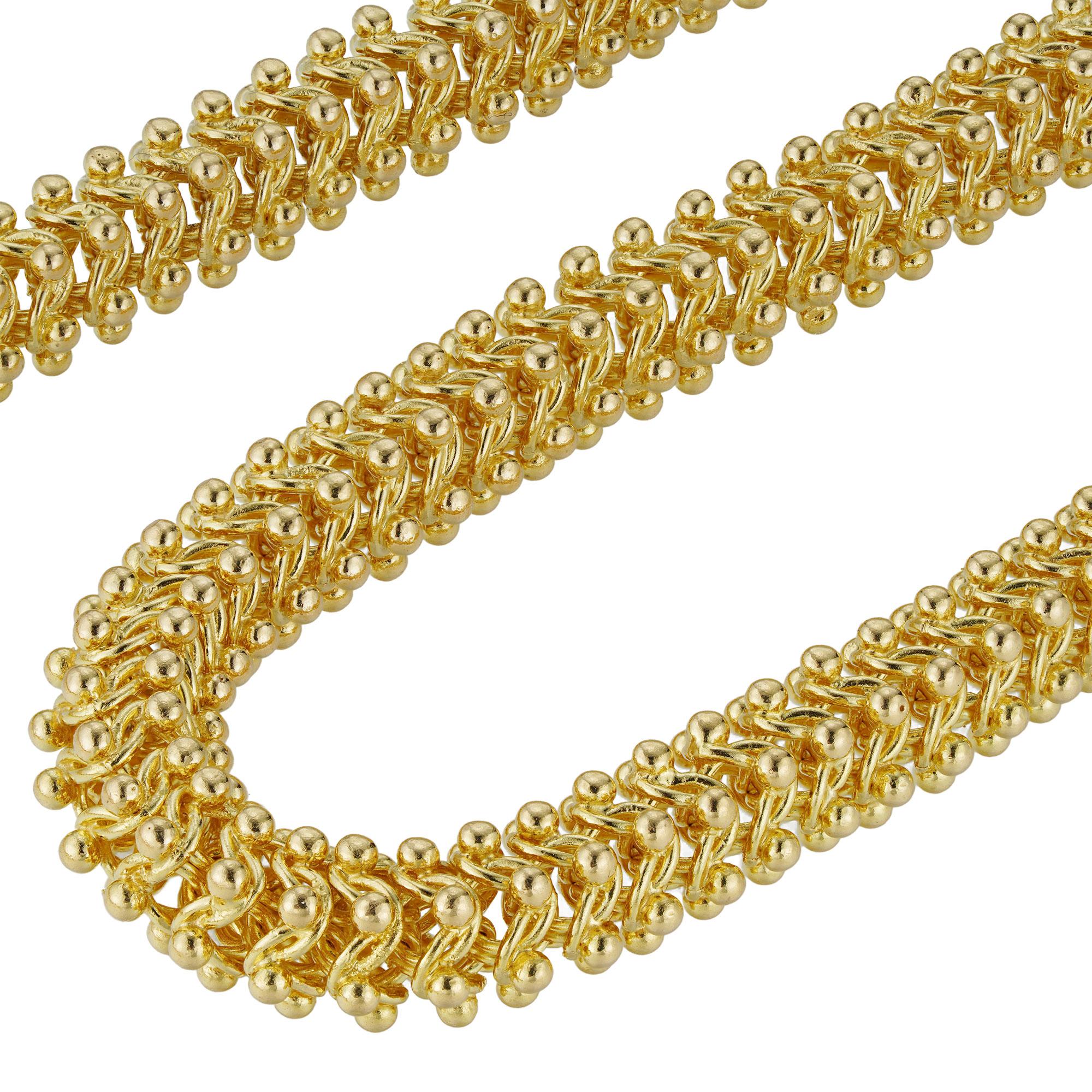 A handmade Scheherazade chain necklace & bracelet suite, by Lucie Heskett-Brem the Gold Weaver of Lucerne, consisting of interlocking links made in yellow gold, with hidden clasps, hallmarked 18ct gold London, the necklace measuring 46 x 0.6cm, the