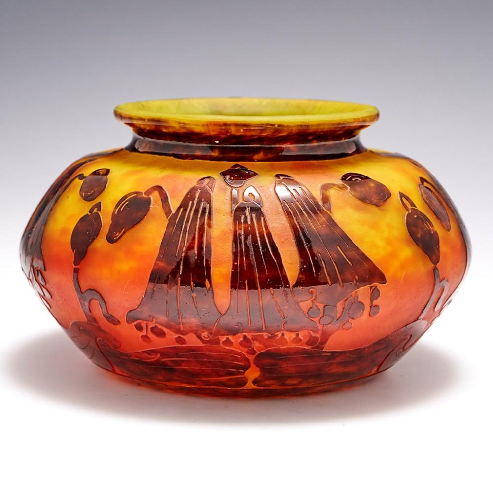 A Schneider Campanules Glass Bowl, c1924

Additional information:
Date : 1922-1926
Origin : Epinay-sur-Seine, France
Colour : Orange and lemon mottled ground, reddish brown high relief acid cameo
Bowl : The design is known as 