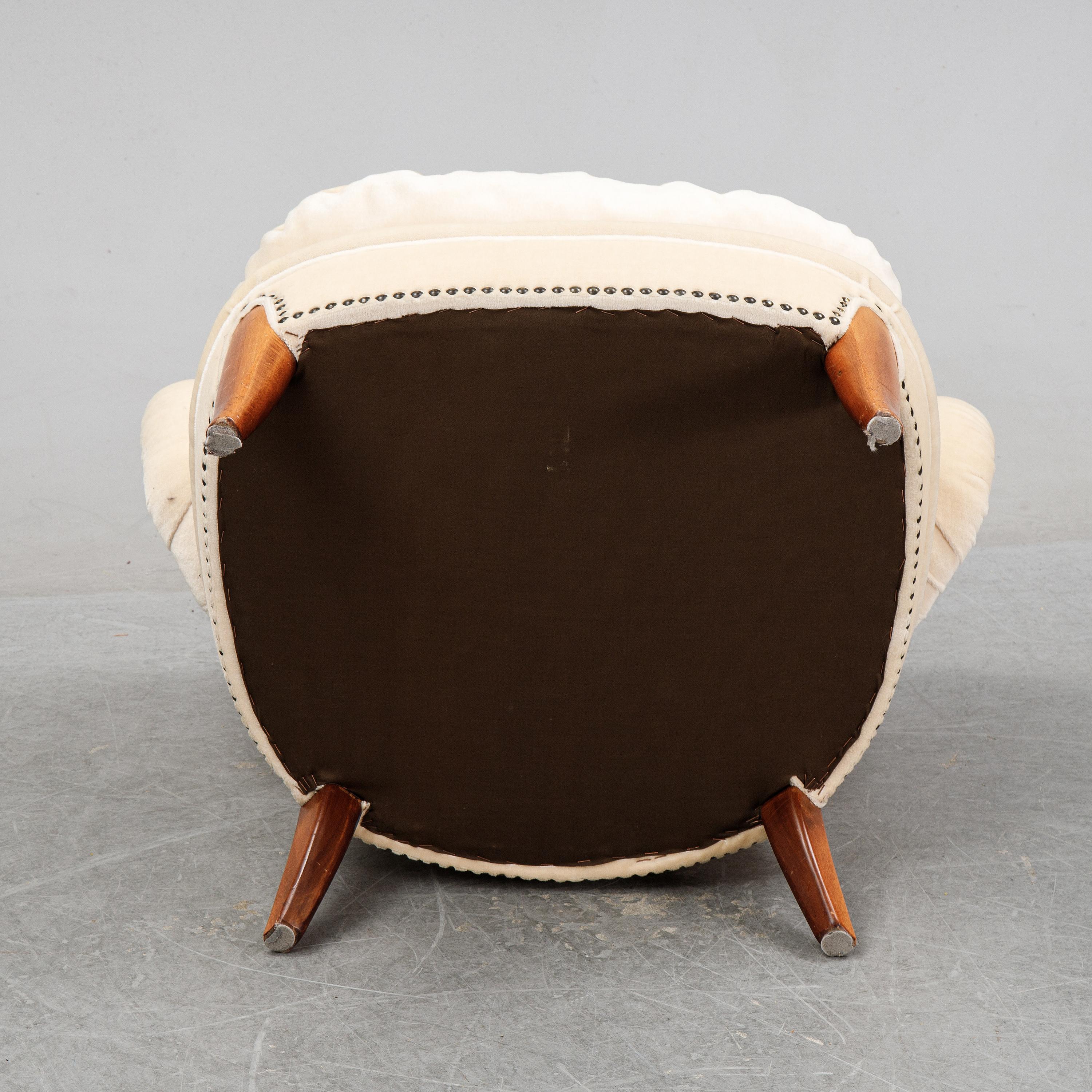 Armchair by Otto Schulz  for Jio Möbler, Jönköping Sweden 1960
Good condition with off white velvet fabric.

The “Schulz” is a model with a design that dates back to 1936 and is a staple piece on lists detailing the most important Swedish furniture