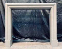 A Scottish Edwardian Hardwood Bolection Fireplace Surround.