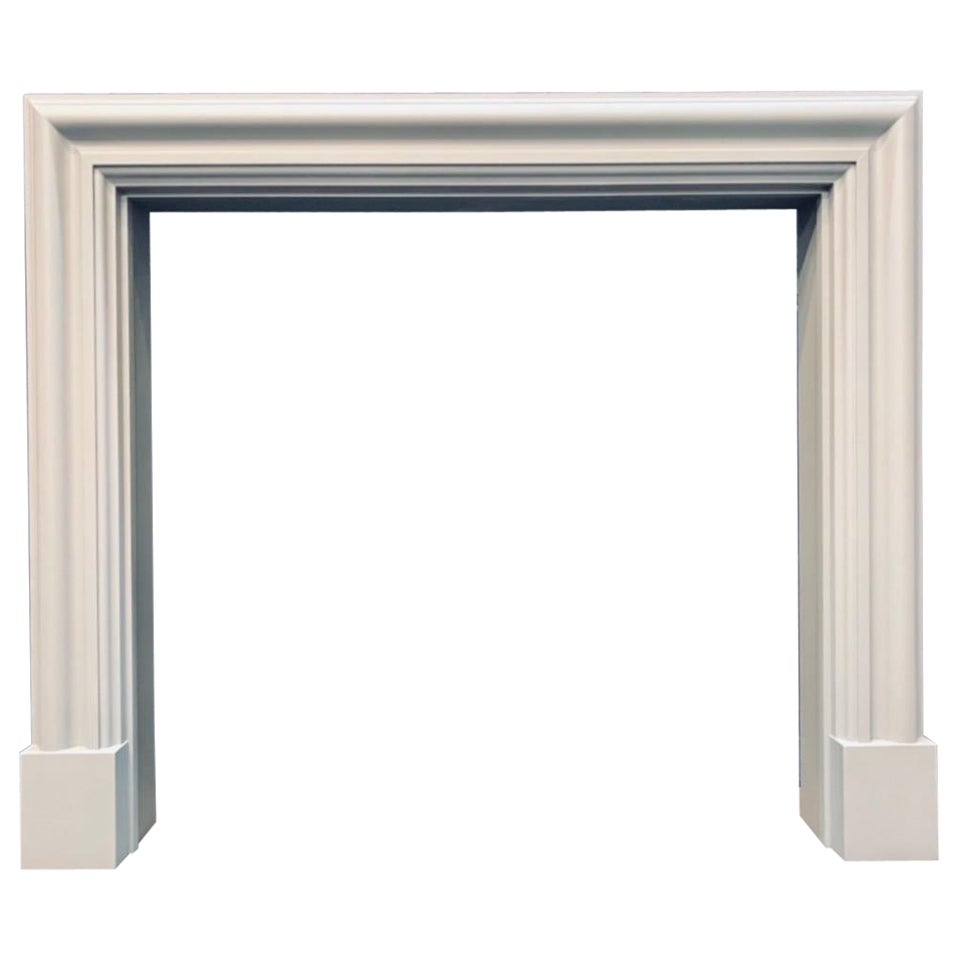 A Scottish Edwardian Hardwood Bolection Fireplace Surround.