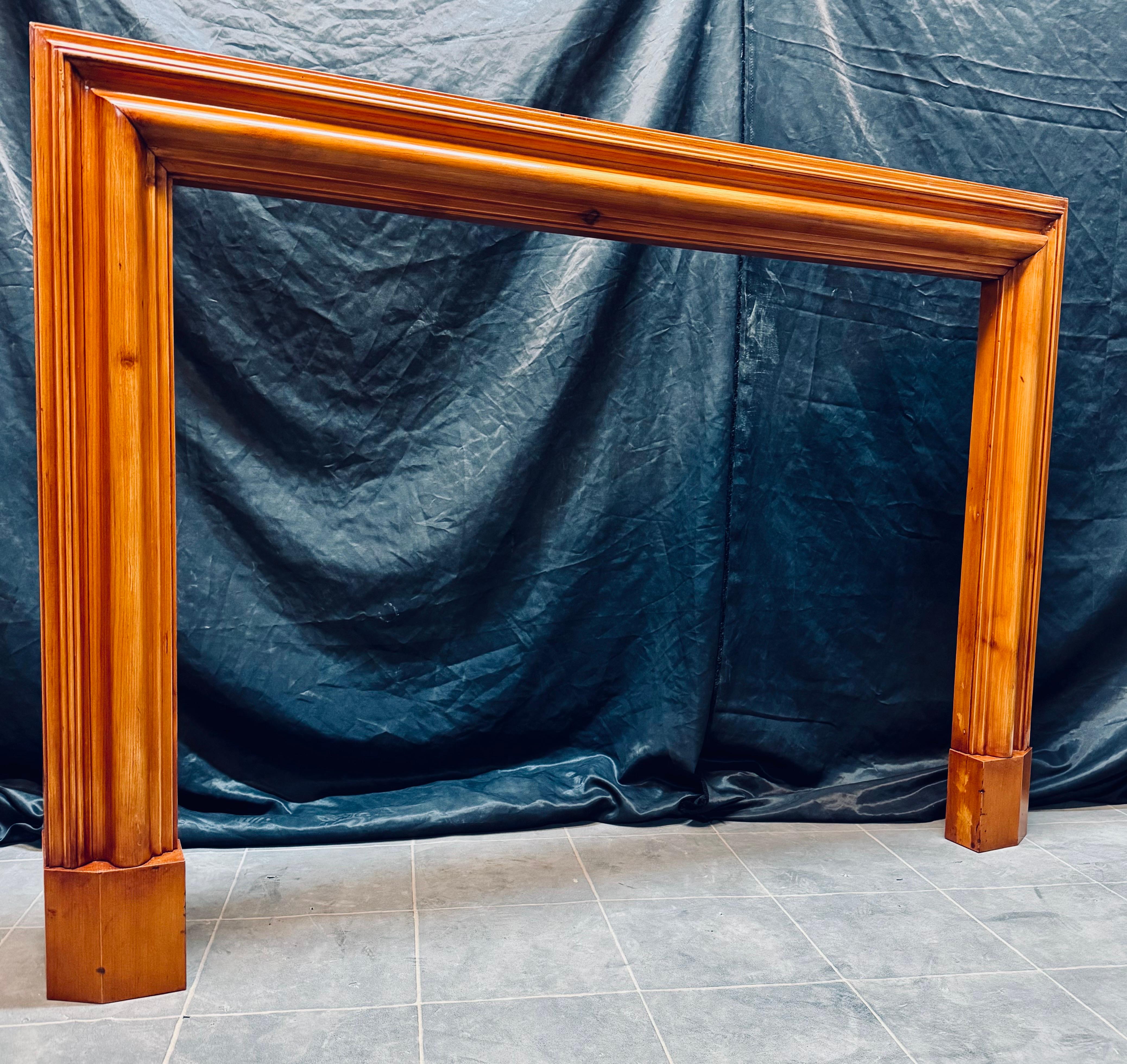Carved A Scottish Edwardian Scots Pine Bolection Fireplace Surround. For Sale