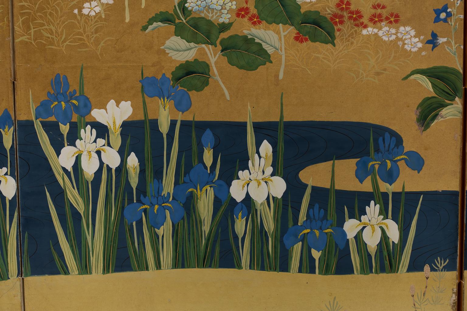 Kano School, Edo period, 19th century

Six-panel folding screens, ink, color, gofun and gold leaf on paper

Measures: 107 by 268 cm

 
The landscape shows a cherry tree in full blossom on the right side and a blue stream on the left. A