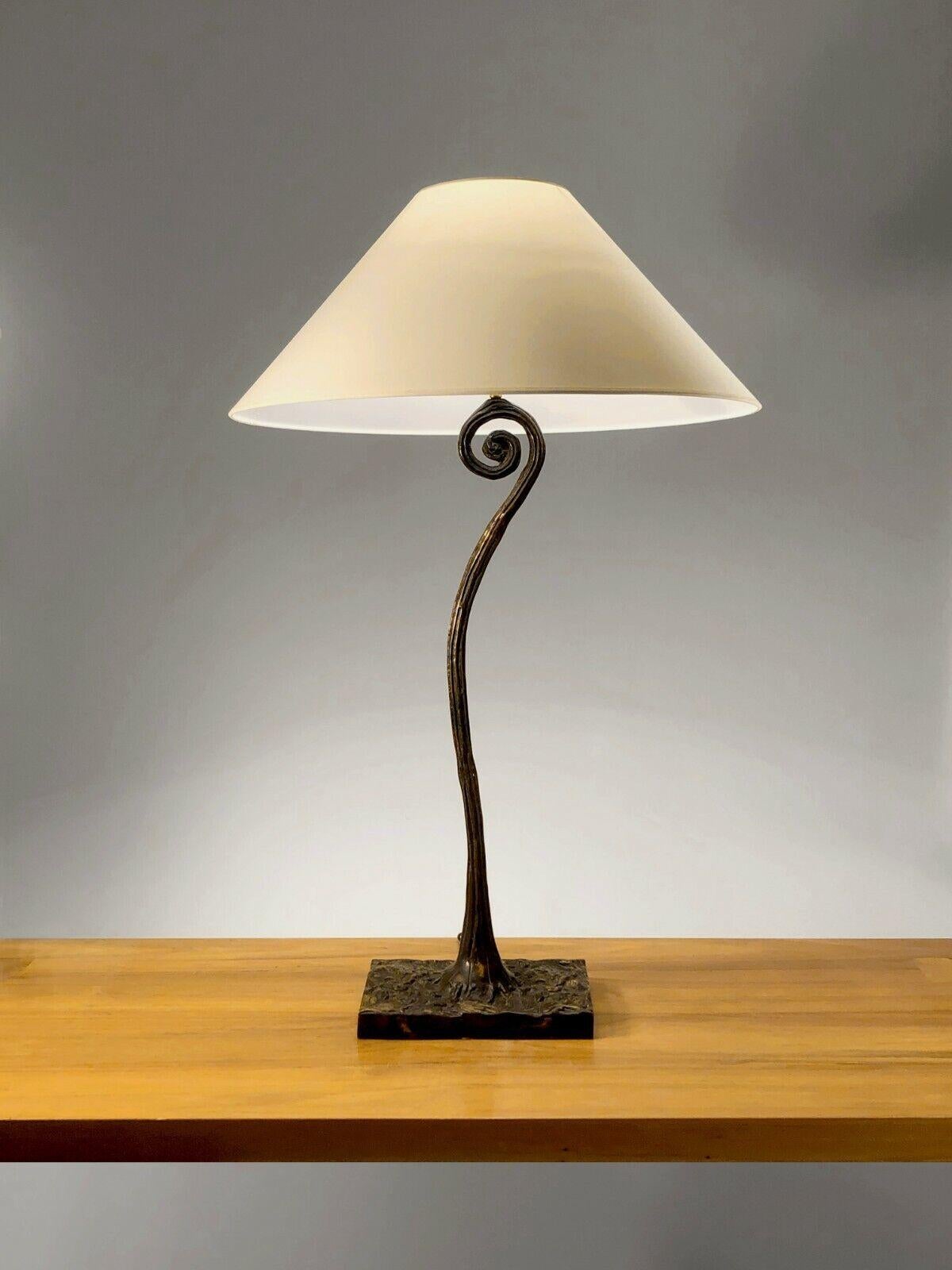 An elegant and sculptural very large table lamp (or small floor lamp) of organic, plant inspiration, Post-Modernist, Neo-Baroque, rectangular base and vertical axis with sculpted bronze body with gunmetal patina, in the spirit of Philippe Anthonioz,