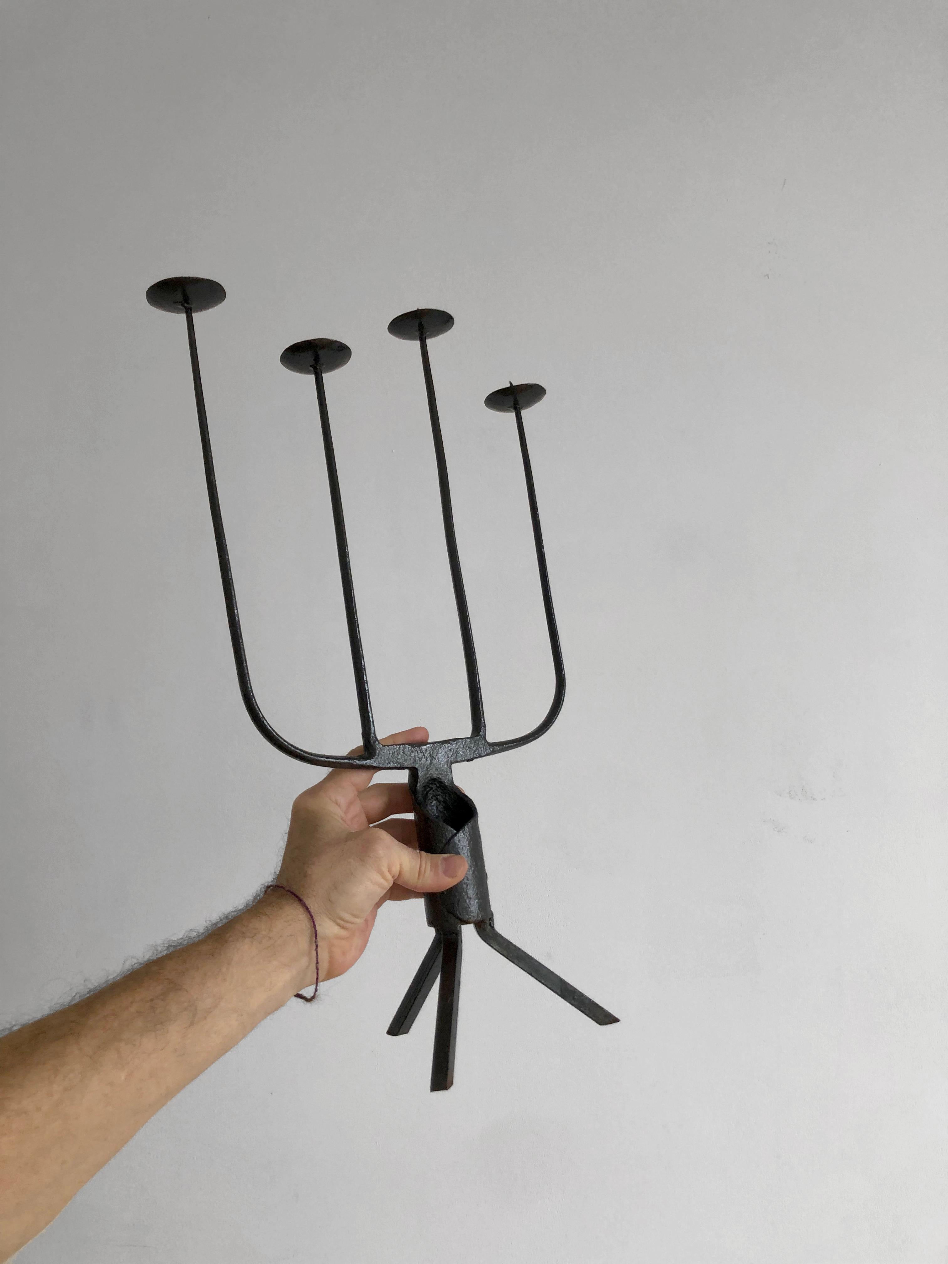 An exceptional sculptural Chandelier, Candelabra, Candlesticks, Candle holder, Brutalist, Rustic Modern, Shabby-Chic,  ,  superb patinated wrought iron structure with 4 long light arms, unique artist piece, to be attributed, France 1950.