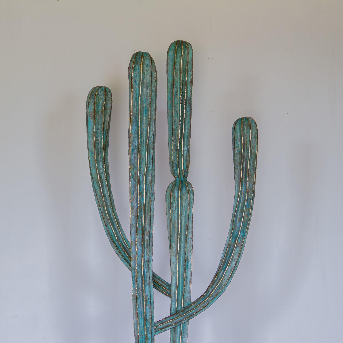 A gilded and oxidized metal cactus sculpture, titled 'Tikal' created by Alain Chervet in 1987, Signed and dated. 

Alain Chervet (1944) is a reclusive, French contemporary artist whose main works include Flora and Fauna. The detail in his works of