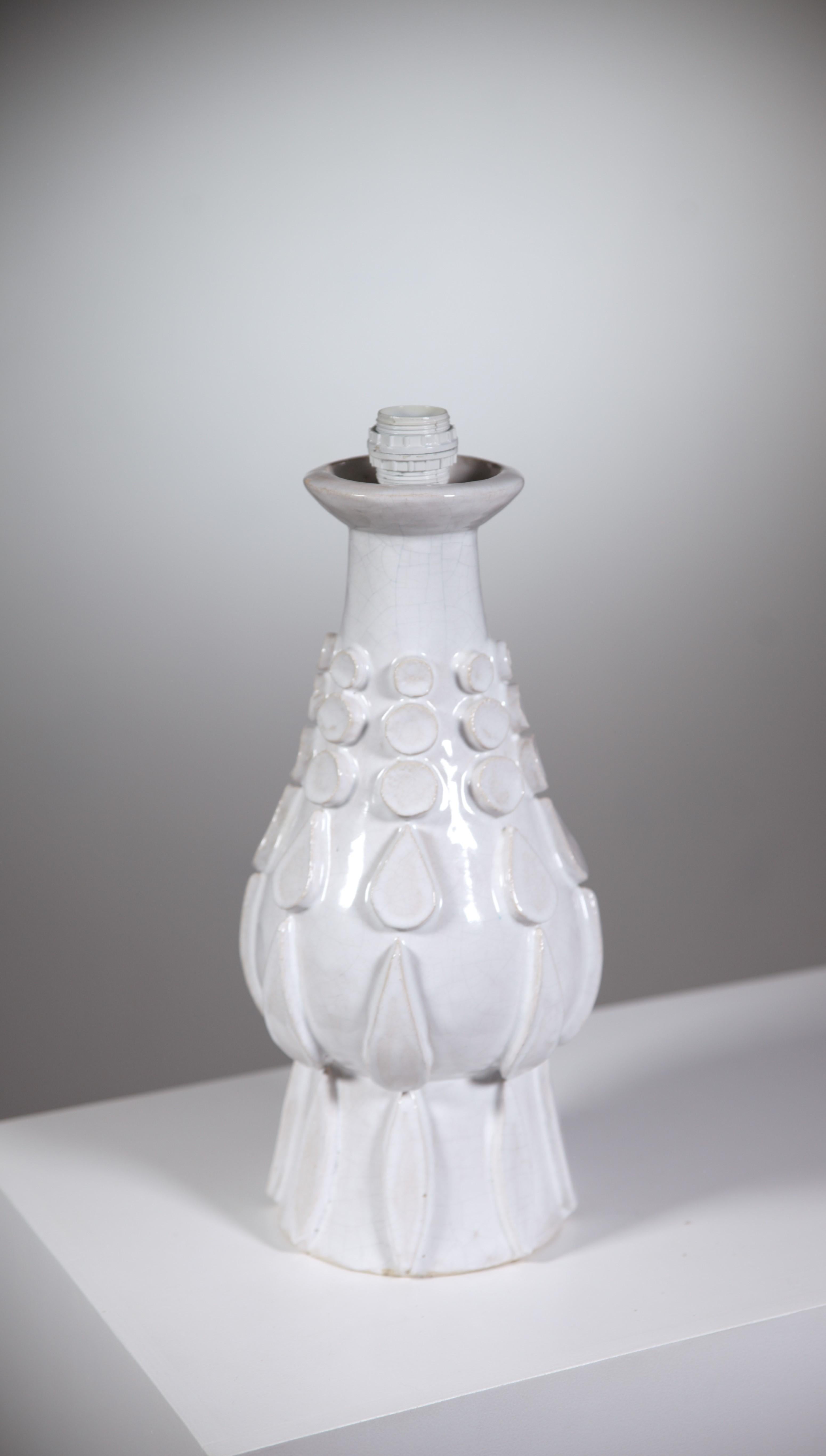 A Ceramic Lamp by Marie Kaikinger.

France 1970s

Nice white cracked ceramic.

Mention : small scratches