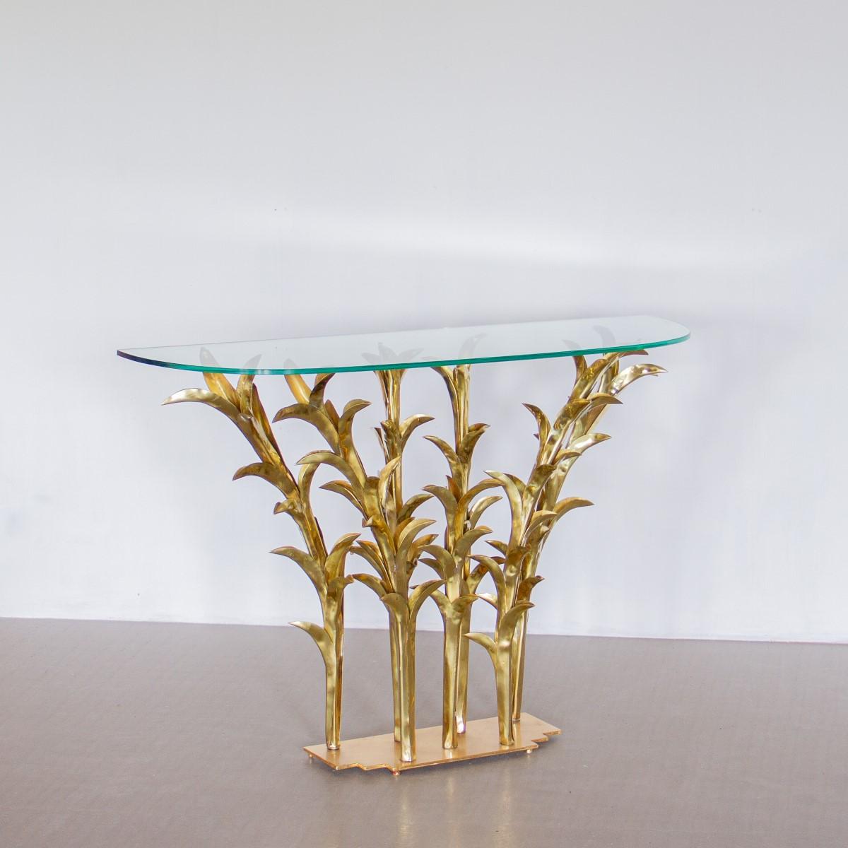 A gilded metal sculpture complete with a glass top to create a console table, titled 'Madere' created by Alain Chervet in 1992, Signed and dated.

Alain Chervet (1944) is a reclusive, French contemporary artist whose main works include Flora and
