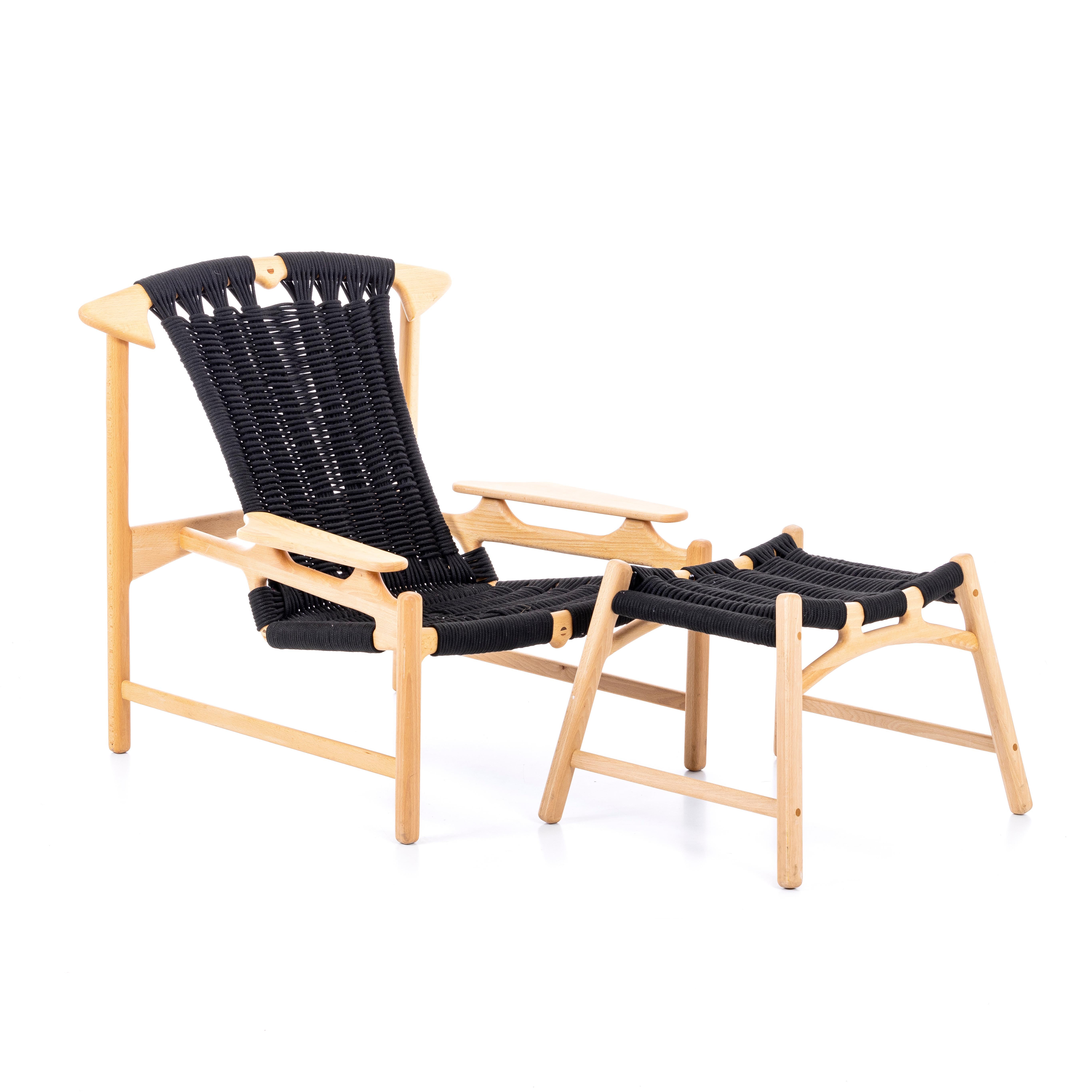 A fine sculptural Martin Godsk-Snedkeri lounge chair and ottoman 'Hunting chair', Model MG27. Made in Denmark, c.1990, in solid recycled beech, seat and back braided in black 6 mm pp line. Inlaid plugs in wenge wood. Designed and produced by Martin