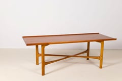 A sculptural teak and oak coffee table by Folke Ohlsen for Bodafors, Sweden 1964