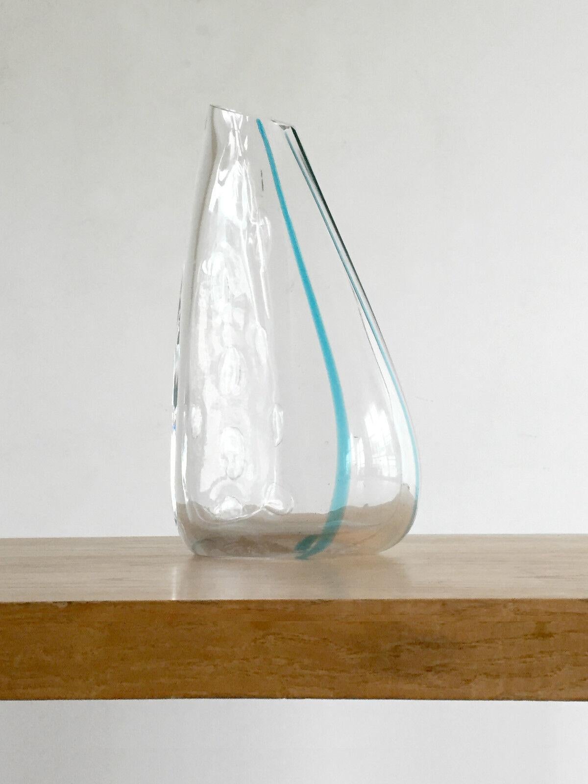 An enormous and sculptural Post-Modernist vase, Free Form, in thick blown glass with ovoid bubbles and 2 turquoise lines, Venini, Murano, Italy 1980-1990.