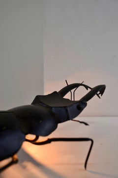 a sculptural vintage 1960s metal beetle lamp – France