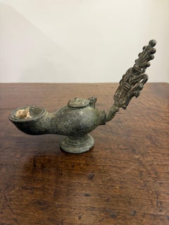 A Seljuk Bronze Oil Lamp, 12th/13th Century