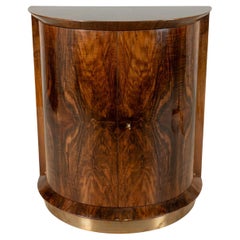 A Semi-circular French Art Deco Bar Cabinet With Mirrored Interior