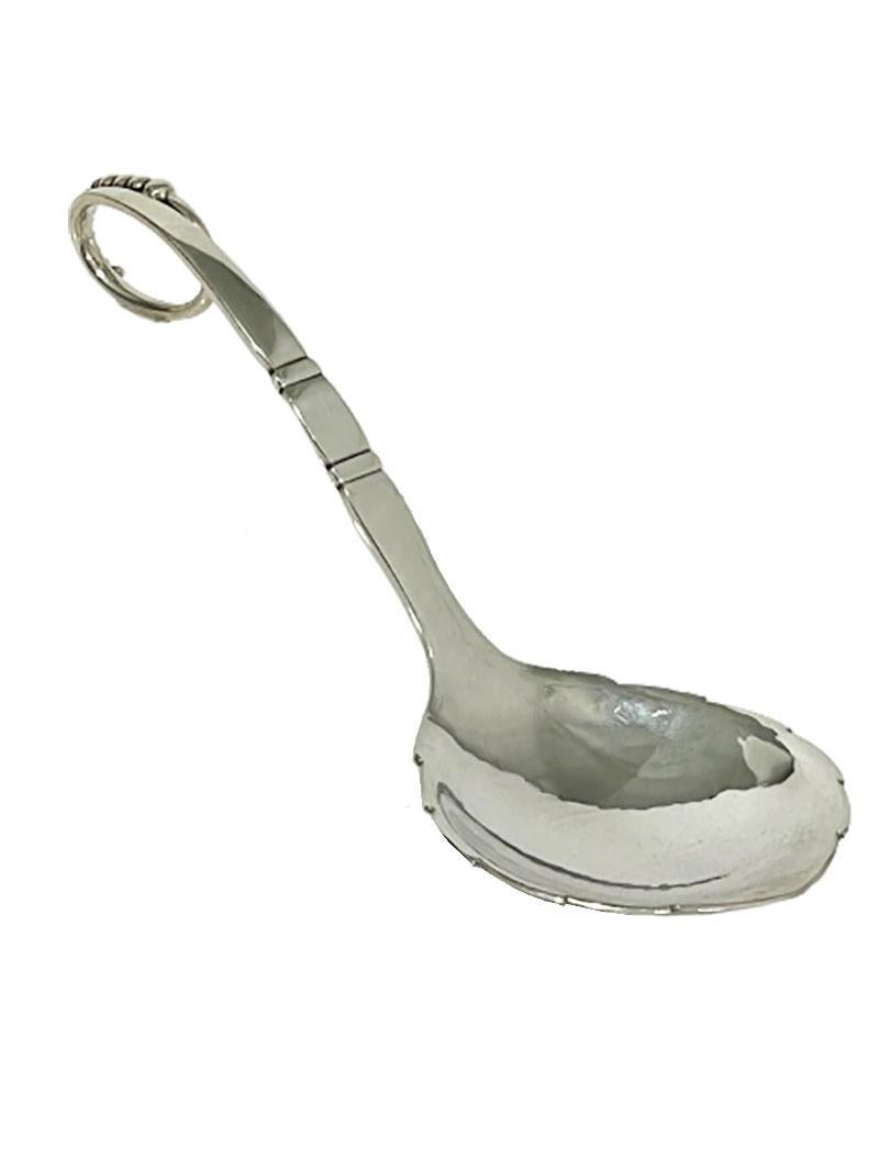 A Serving Spoon from Georg Jensen, Model 41, Denmark, '1945' In Good Condition For Sale In Delft, NL