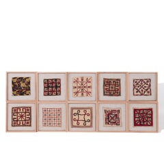 A Set of 10 Antique Turkmen Embroidered Framed Amulets , Early 20th Century.