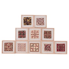 A Set of 10 Antique Turkmen Embroidered Framed Amulets , Early 20th Century.