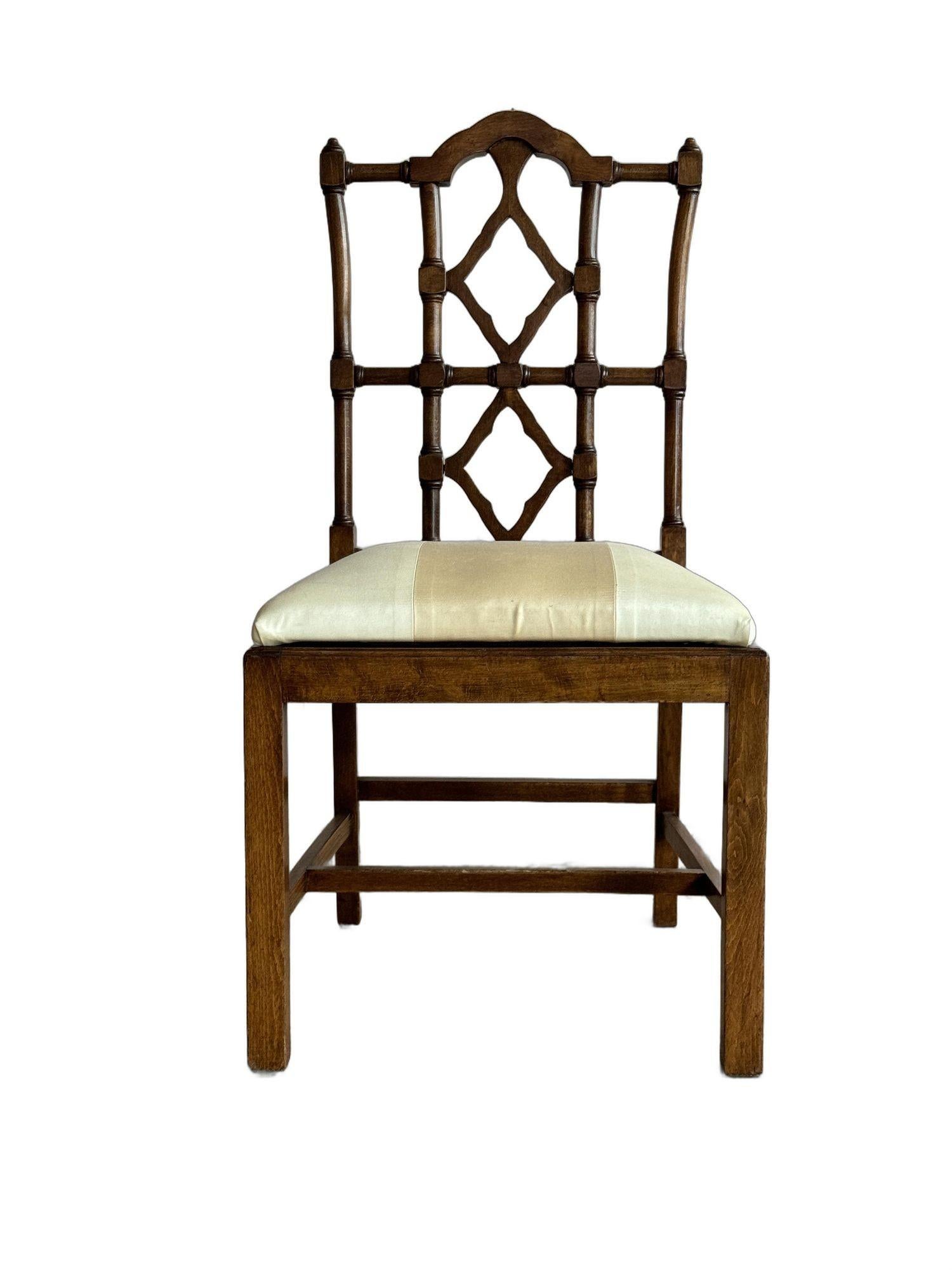 Beech A set of 10 Chinese chippendale style dining chairs
