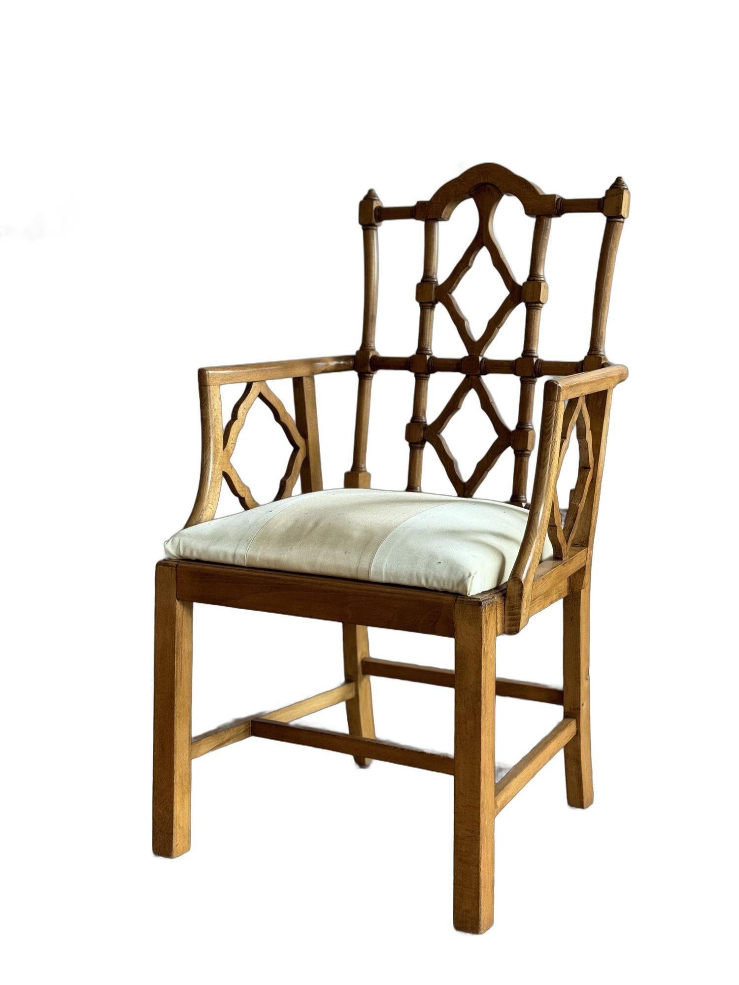 A set of 10 Chinese chippendale style dining chairs 1