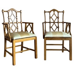 A set of 10 Chinese chippendale style dining chairs