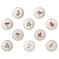 A set of 10 hand painted porcelain Vista Alegre dessert plates