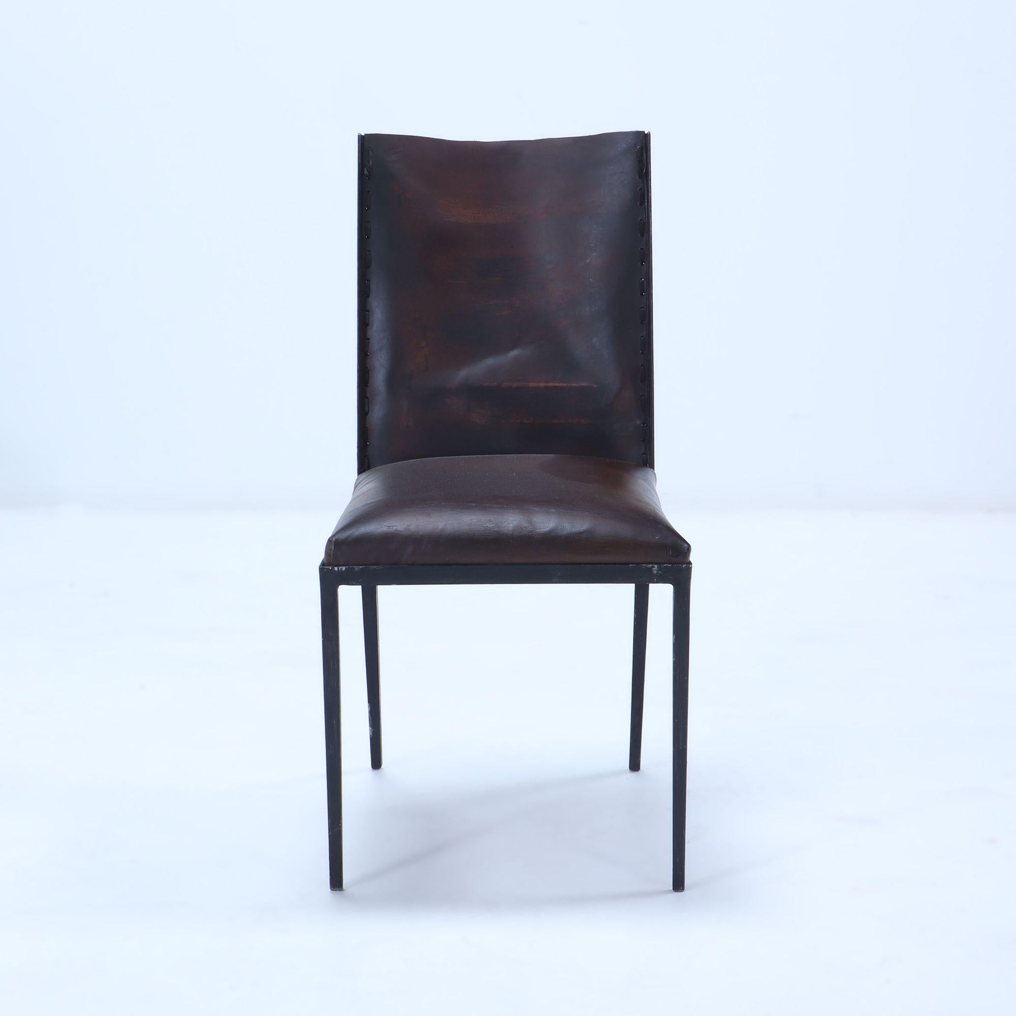 Mid-Century Modern A set of 10 iron and leather dining chairs, in the manner of J.M Frank For Sale