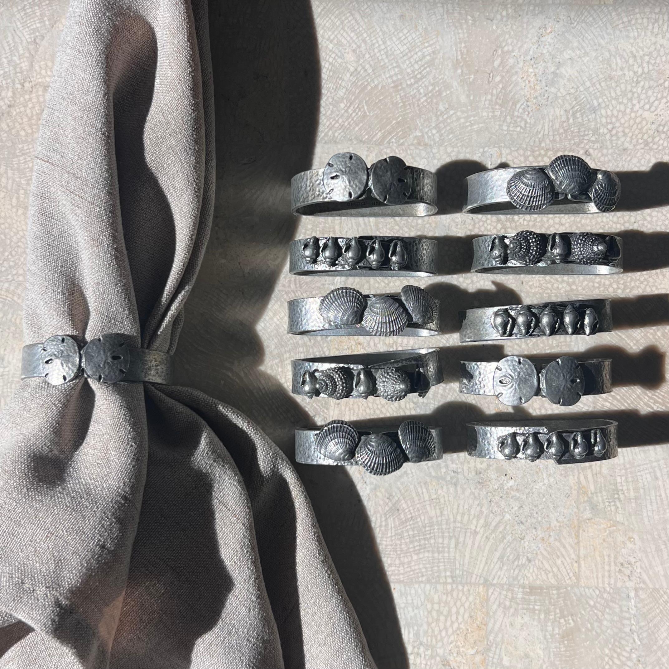A set of 11 pewter napkin rings with sculpted shells, 1975 For Sale 2
