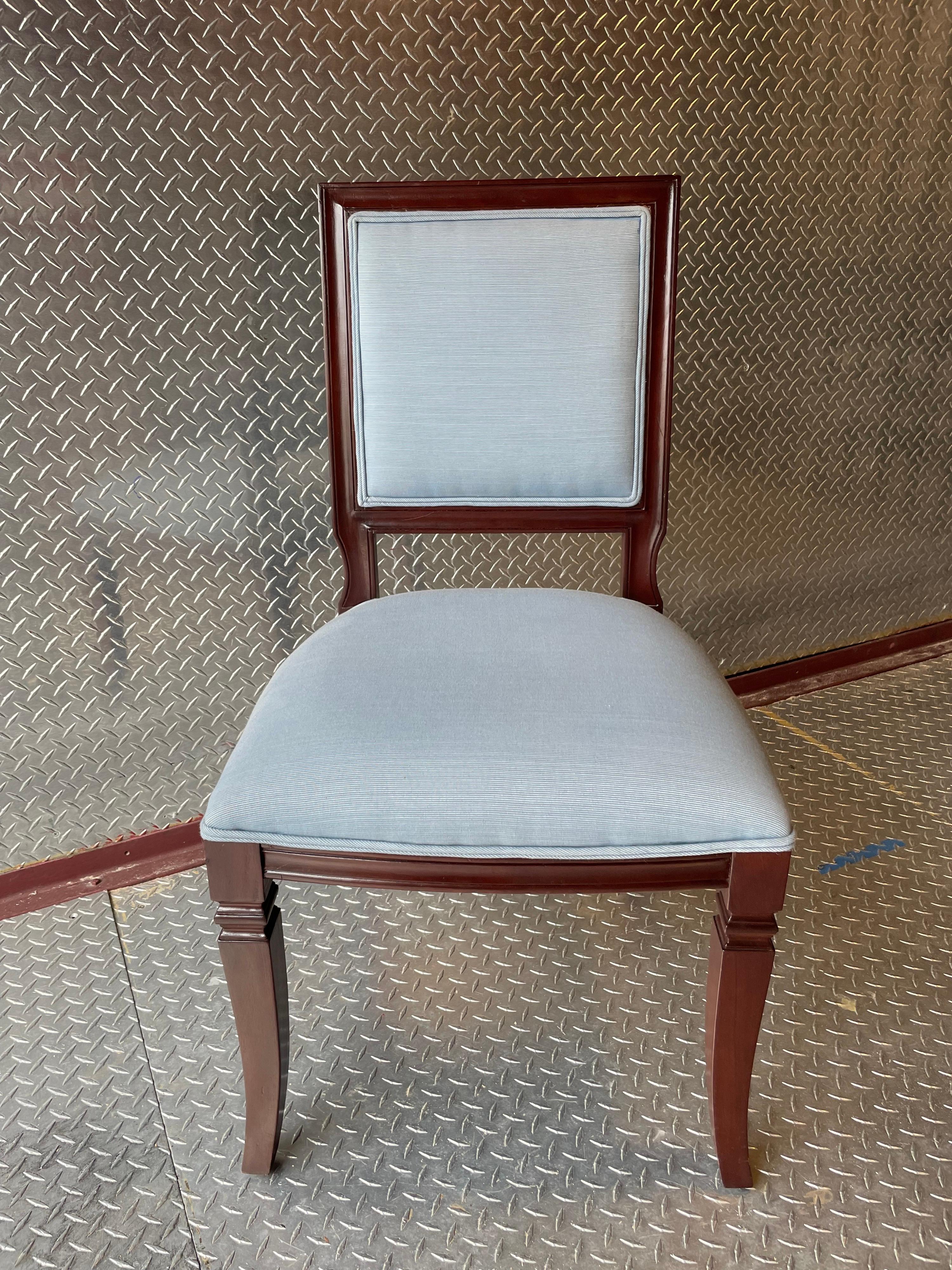 A set of 12 French Directoire style dining chairs. Elegant and stylish this set will complete any dining room table.