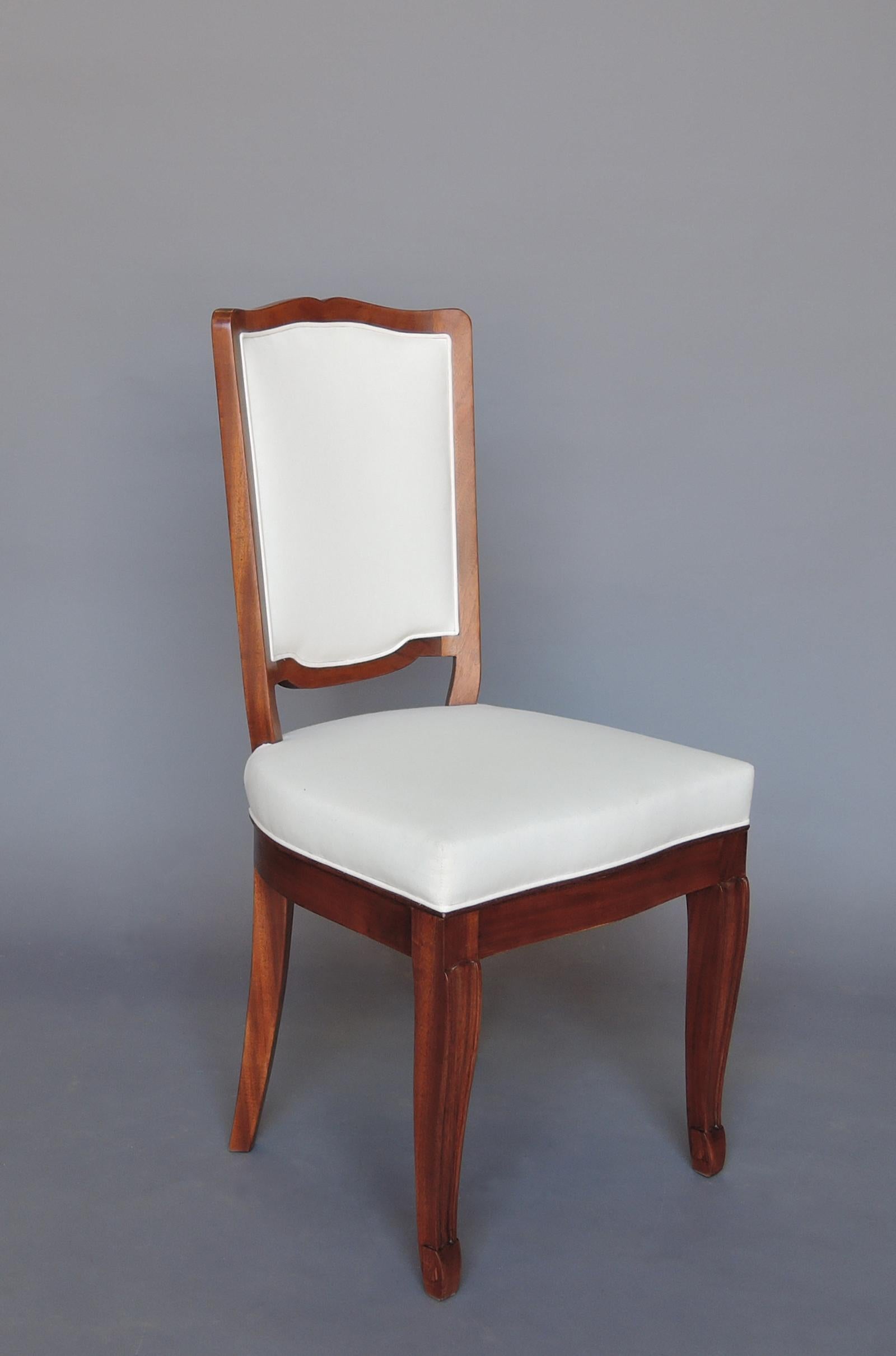 A Set of 12 Fine French Art Deco Mahogany Dining Chairs in the Manner of Arbus In Good Condition In Long Island City, NY