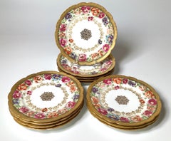 A Set of 12 French Hand Painted Porcelain Luncheon Accent Plates, Circa 1890
